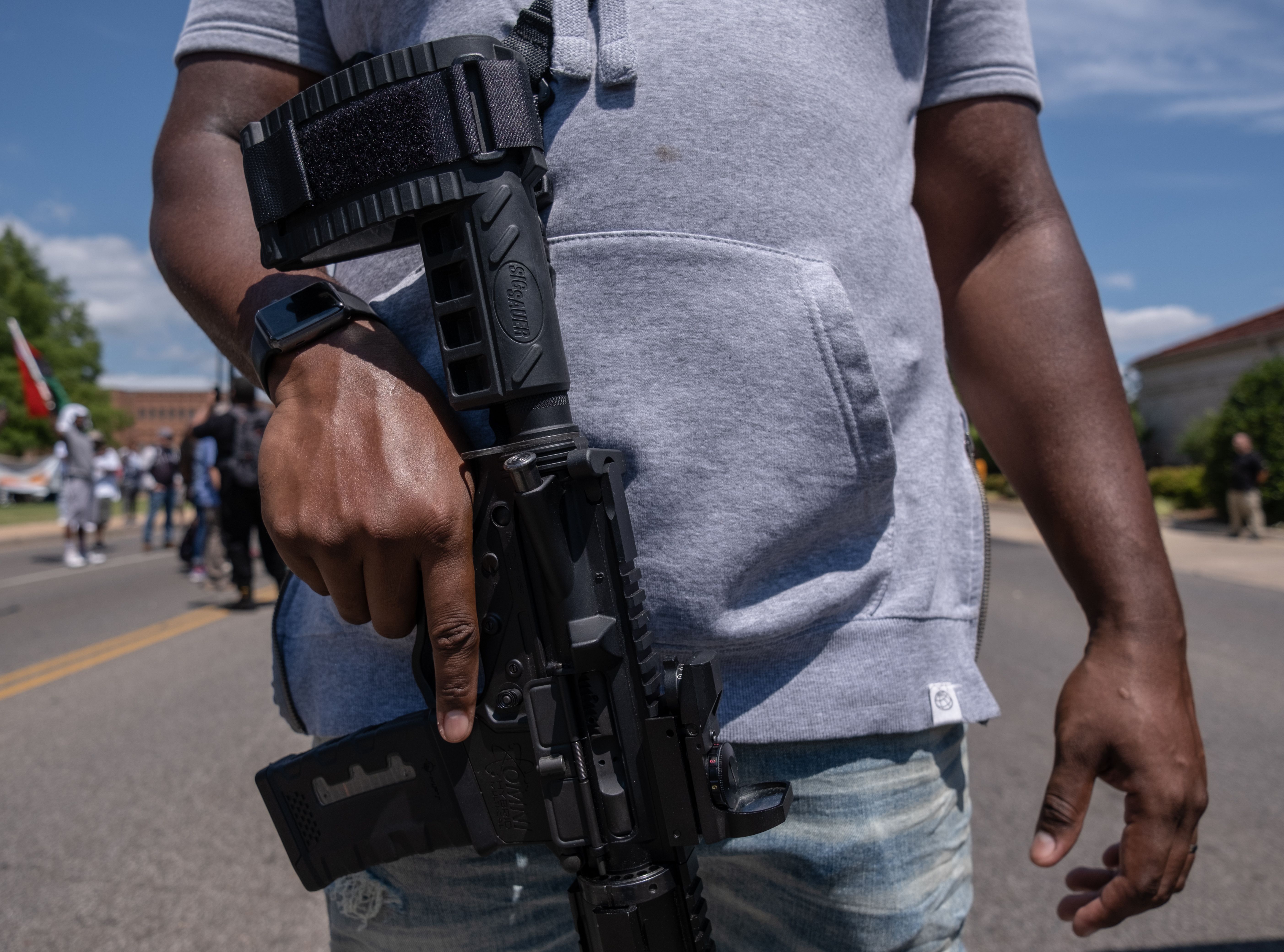 Black gun owners march to the governor's mansion in Oklahoma City, Oklahoma on June 20,2020 during a pro-second amendment rally on the same day that US President Donald Trump's holds his first political rally in months amid the coronavirus pandemic. (Photo by SETH HERALD / AFP) (Photo by SETH HERALD/AFP via Getty Images)