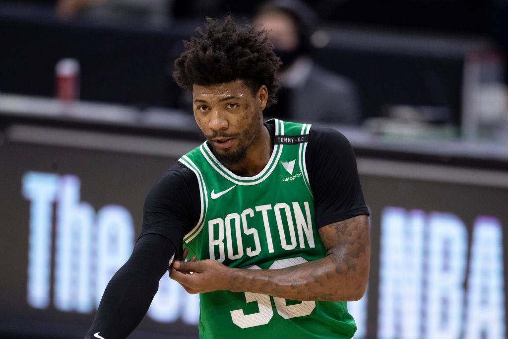 PHILADELPHIA, PA - JANUARY 20: Marcus Smart #36 of the Boston Celtics looks on against the Philadelphia 76ers at the Wells Fargo Center on January 20, 2021 in Philadelphia, Pennsylvania. The 76ers defeated the Celtics 117-109. NOTE TO USER: User expressly acknowledges and agrees that, by downloading and or using this photograph, User is consenting to the terms and conditions of the Getty Images License Agreement. (Photo by Mitchell Leff/Getty Images)