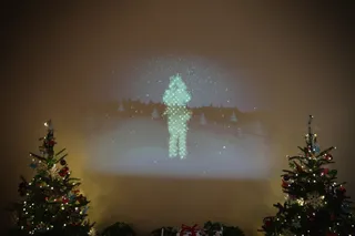 It Can See You! - An interactive installation that visualizes visitors in a snowscape projected on the wall with live movement is seen at the East Garden Room.  (Photo: Alex Wong/Getty Images)