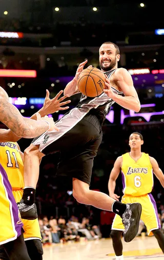 Manu Ginobili - Tim Duncan isn't the only 35-and-over star on the San Antonio Spurs. Manu Ginobili has been there for four championship runs and he too is still getting it done on the court with 11.4 points and four assists per game.&nbsp;(Photo: Stephen Dunn/Getty Images)