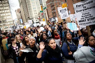 #HandsUpWalkOut - Thousands of protesters around the country hit the streets on Dec. 1 to participate in the #HandsUpWalkOut protests in their cities to protest a Ferguson grand jury's decision&nbsp;not to indict Officer Darren Wilson&nbsp;in the death of&nbsp;Michael Brown. Take a look at images from demonstrations from Nov. 24 until today.  (Photo: Andrew Burton/Getty Images)