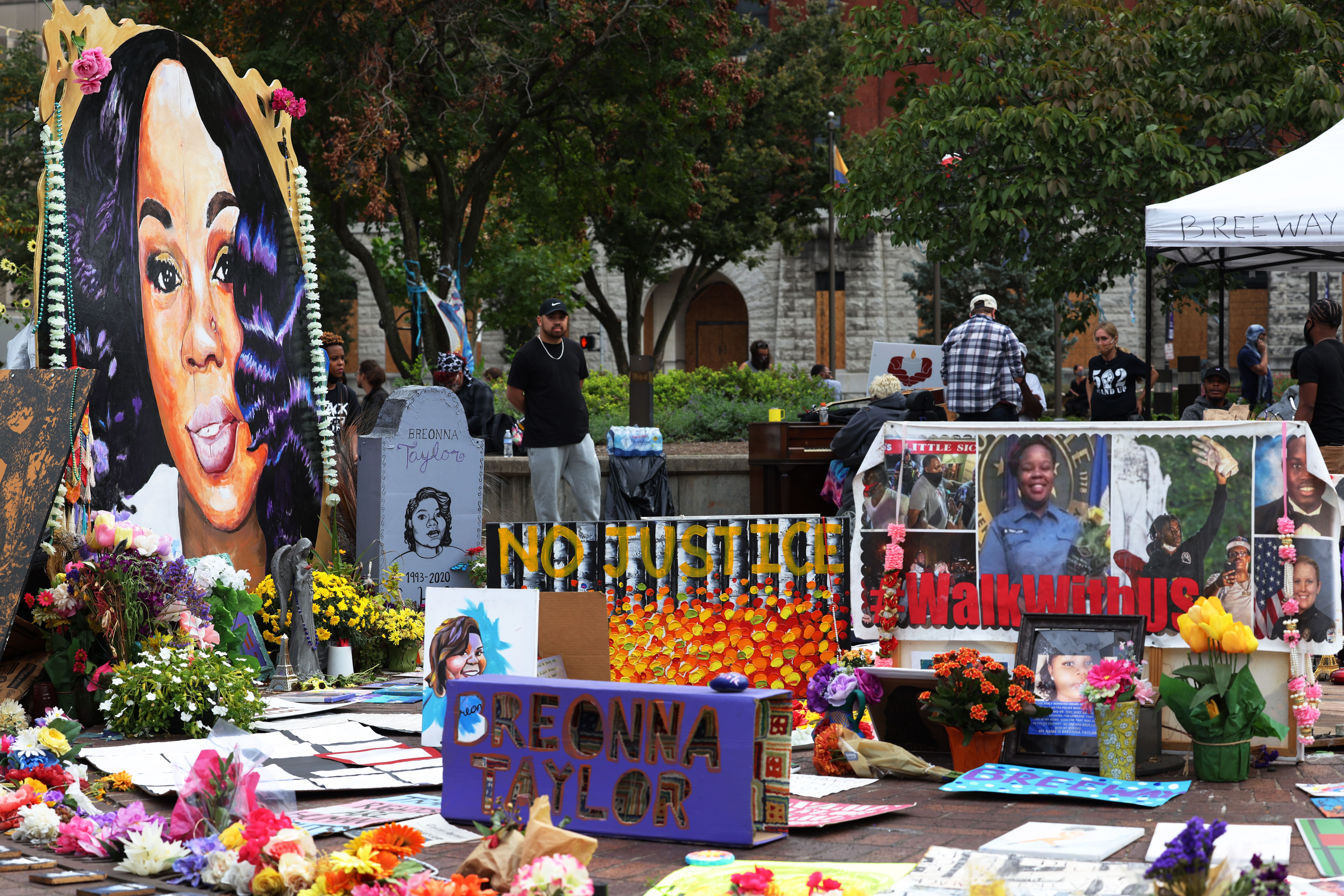 LOUISVILLE, KENTUCKY - SEPTEMBER 26: People gather at the Breonna Taylor memorial in Jefferson Square Park as they prepare to march for the third day since the release of the grand jury report on September 26, 2020 in Louisville, Kentucky. A Kentucky grand jury indicted one police officer involved in the shooting of Breonna Taylor with three counts of wanton endangerment. No officers were indicted on charges in connection to Taylor's death. (Photo by Michael M. Santiago/Getty Images)