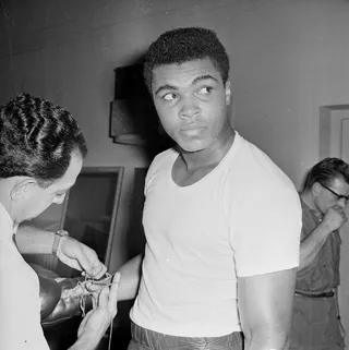 Campaign Against Stun Guns - In 1999, Muhammad Ali joined Amnesty International in their campaign to end the use of stun belts on prisoners in the U.S. The champion was then honored by the human rights organization with a “Lifetime Achievement Award.”   (Photo: Norman Quicke/Express/Getty Images)