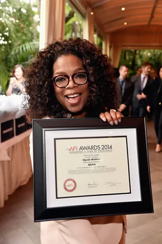 Award Tour - Oprah Winfrey poses with her award during the 15th Annual American Film Institute Awards at the Four Seasons Hotel in Beverly Hills.(Photo: Frazer Harrison/Getty Images for AFI)