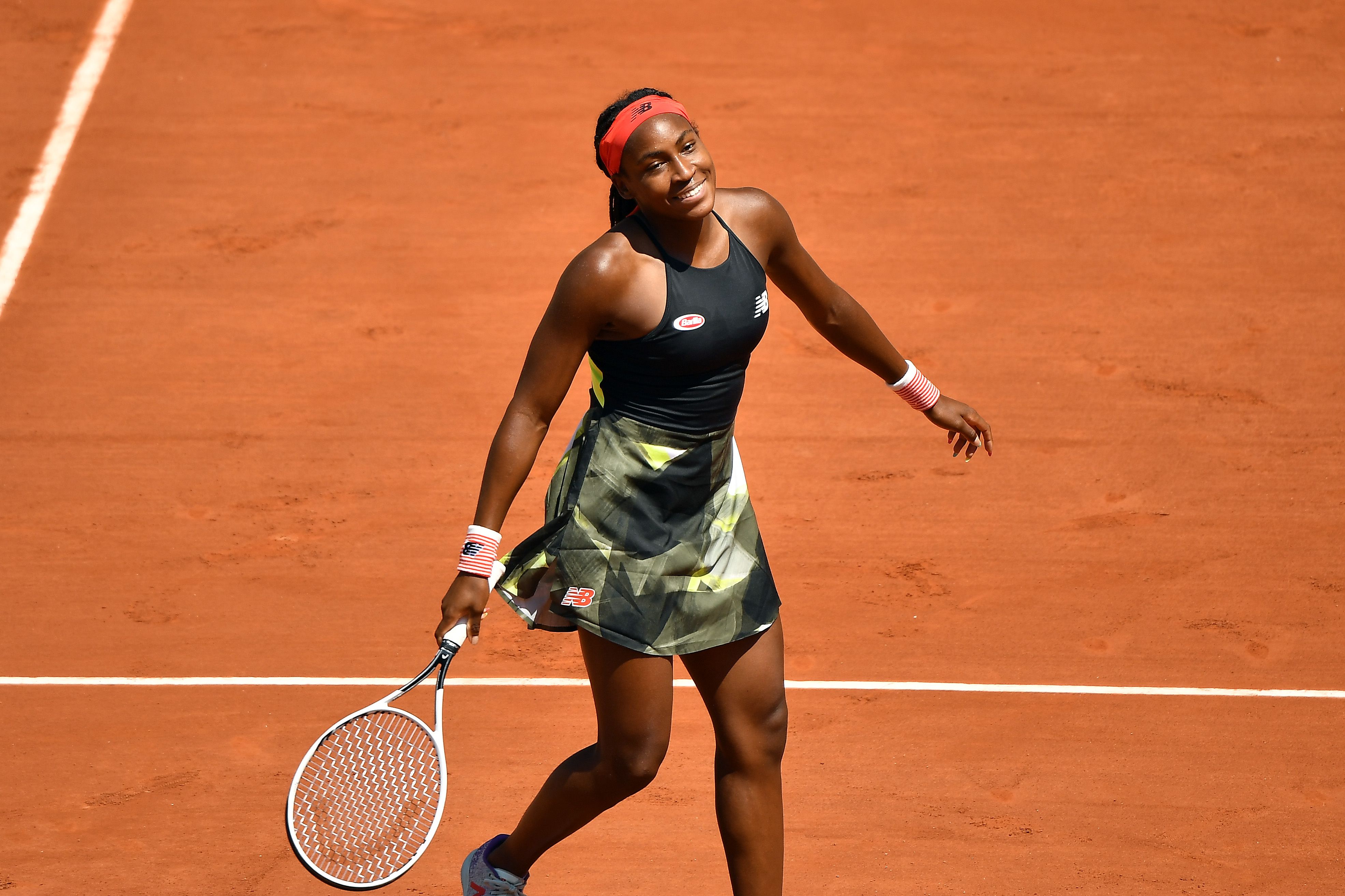 PARIS, FRANCE - JUNE 07:  Coco Gauff of The United States reacts after winning their ladies singles fourth round match against Ons Jabeur of Tunisia during day nine of the 2021 French Open at Roland Garros on June 07, 2021 in Paris, France. (Photo by Aurelien Meunier/Getty Images)