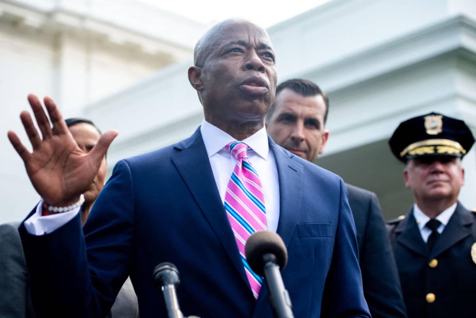 Brooklyn Borough President and New York City mayoral candidate Eric Adams (C) speaks to the media alongside other local and law enforcement officials outside the West Wing of the White House in Washington, DC, July 12, 2021, after attending a meeting with US President Joe Biden about reducing gun violence. (Photo by SAUL LOEB / AFP) (Photo by SAUL LOEB/AFP via Getty Images)