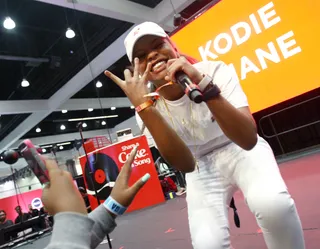 Get It Kodie! - The rapper throws up a West Coast hand sign as she performs her infectious songs.&nbsp;&nbsp;(Photo: Tommaso Boddi/BET/Getty Images for BET)