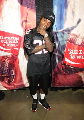 All-Black Everything... With a Touch of Red - Jacquees does it for Coca-Cola in black-and-red attire. Don't sleep on him — peep his watch and shoe game.&nbsp;(Photo: Tommaso Boddi/BET/Getty Images for BET)