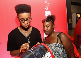 Another One - Jarad Dawkins of Unlocking the Truth takes out his Sharpie to make a fan's day.(Photo: Tommaso Boddi/BET/Getty Images for BET)&nbsp;