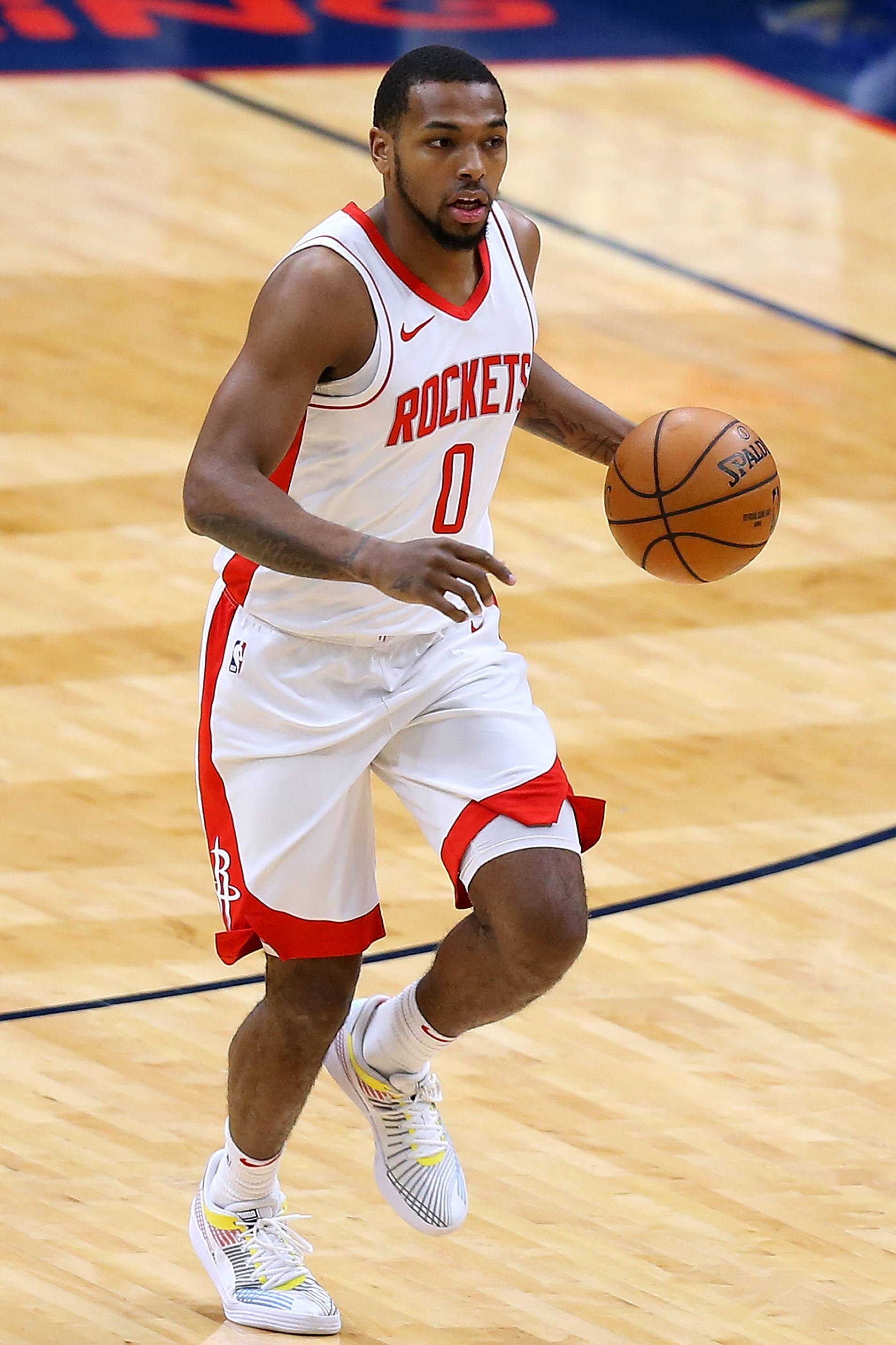 NEW ORLEANS, LOUISIANA - FEBRUARY 09: Sterling Brown #0 of the Houston Rockets drives with the ball against the New Orleans Pelicans during the first half at the Smoothie King Center on February 09, 2021 in New Orleans, Louisiana. NOTE TO USER: User expressly acknowledges and agrees that, by downloading and or using this Photograph, user is consenting to the terms and conditions of the Getty Images License Agreement. (Photo by Jonathan Bachman/Getty Images)