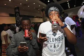 Digital Beverage - Coca-Cola has a new generation of multitasking fans who post while they take a swig of their favorite soda.&nbsp;(Photo: Tommaso Boddi/BET/Getty Images for BET)&nbsp;