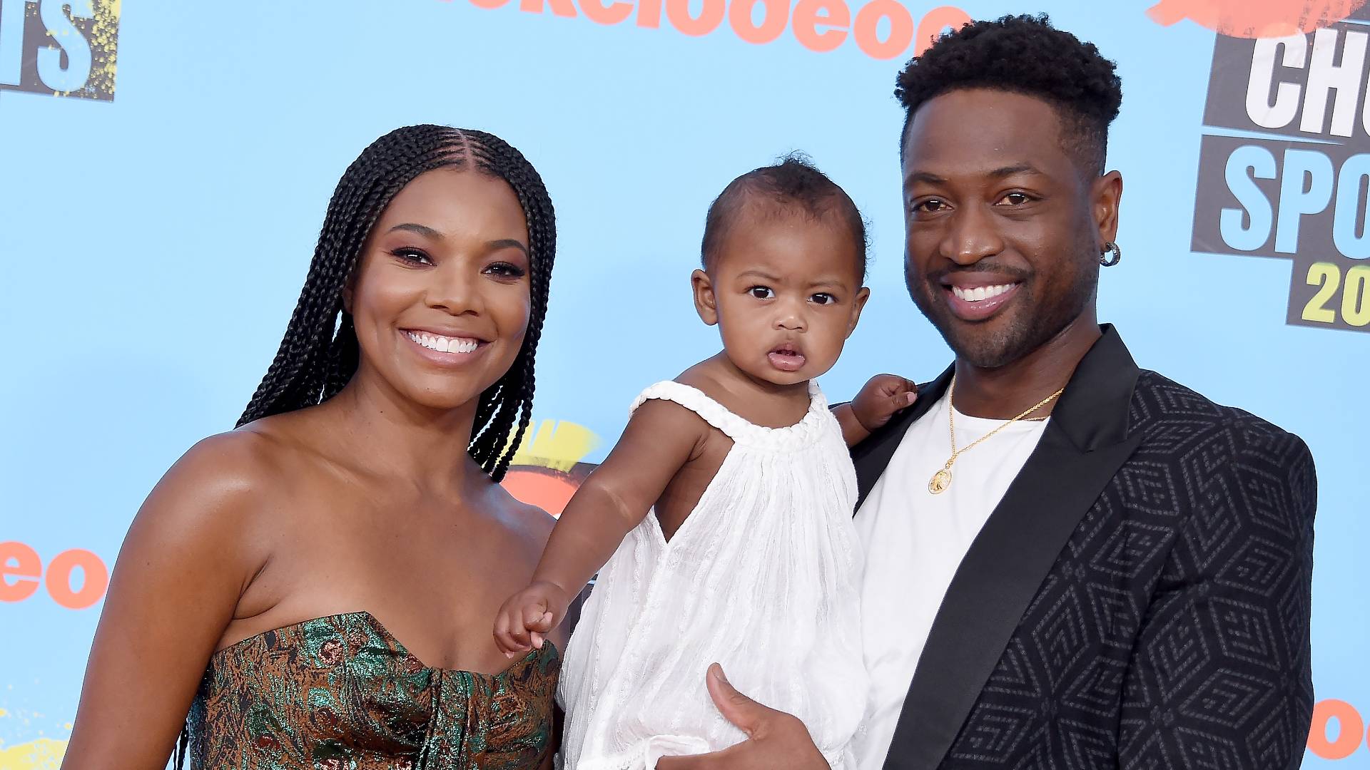 Gabrielle Union, Kaavia James Union Wade, and Dwyane Wade attend Nickelodeon Kids' Choice Sports 2019 at Barker Hangar on July 11, 2019 in Santa Monica, California.