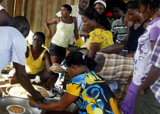 Long Wait - The migrants arriving in Brasileia are waiting patiently as Brazil irons out the situations. The government has stated that Haitians are first in line to grab one of the limited work visas that are distributed every year.(Photo: Mariana Bazo/REUTERS)