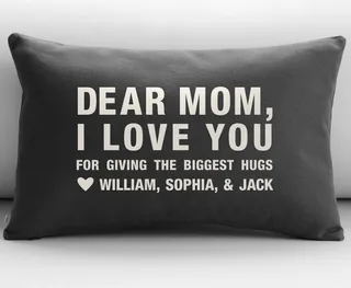 Personalized Dear Mom Throw Pillow Cover - Show her how you really feel with this customized pillow. Just fill in the blank with your name and a personalized message.   (Photo: Courtesy Red Envelope)