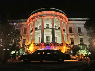 Trick or Treat! - The South Portico of the White House was decorated and lit in orange lights for Halloween. President Obama and First Lady Michelle Obama welcomed local children and children of military families to enjoy the "scariest" day of the year. — Joyce Jones  (Photo: AP Photo/Pablo Martinez Monsivais)