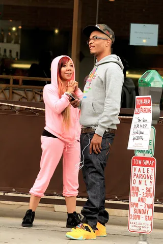 Oh, Love - Tiny looks on lovingly at her hubby T.I. as they wait for valet parking on Bedford Drive in Beverly Hills.&nbsp;(Photo: Winston Burris/WENN.com)