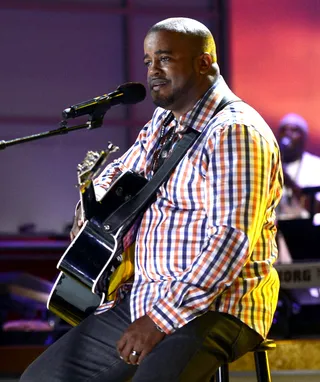 Jason Nelson - &quot;Shifting the Atomphere&quot; singer Jason Nelson gets his guitar's acoustic right in rehearsal.&nbsp;(Photo: Kevin Winter/Getty Images for BET)