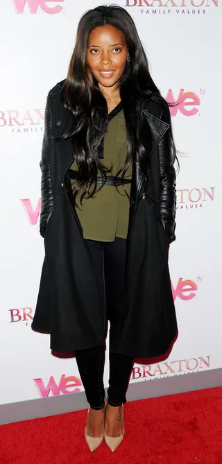 Angela Simmons - The Pastry designer arrives at the Braxton Family Values NYC premiere party in skinny jeans and an army green blouse. She completes the look with nude pumps and glossy waves.  (Photo: Ivan Nikolov/WENN.com)