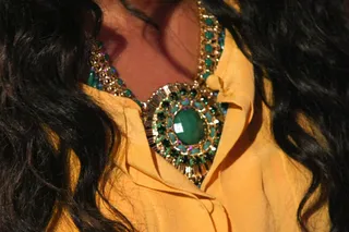 Jewel Tones - Angela Simmons' necklace glimmers in the light. (Photo: Bennett Raglin/BET/Getty Images for BET)