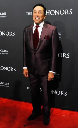 Legendary - Motown legend Smokey Robinson shows out in his purple tux coupled with matching shoes and burgundy accents.  (Photo: Larry French/BET/Getty Images for BET)