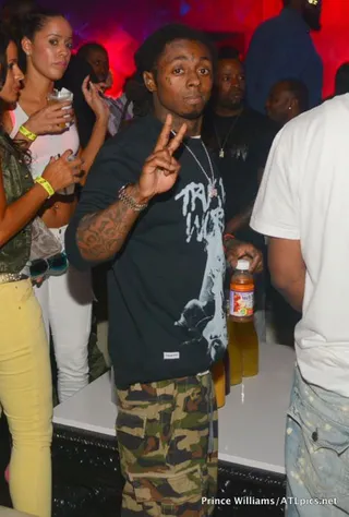 The After- Party - Lil Wayne is seen with his co-headliner T.I. and the rest of YMCMB celebrating their "Americas Most Wanted" tour with Hennessy V.S and Belvedere at Prive Lounge in Atlanta. (Photo: Prince Williams / ATL Pics.com)