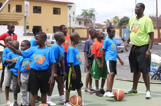 Training the Next Generation - Also setting the bar high for his compatriots is Nigerian native Olumide Oyedeji (right). The former Seattle Supersonics and Orlando Magic center who now plays professionally in Japan also launched his own camp in his hometown.(Photo: AP Photo/Sunday Alamba)