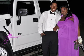 Humvee Stuntin' - Here's Jocelyn and her prom date in front of the white stretch Hummer that Toya hired to pick her up. We know he'd better have bought her a beautiful corsage. He's lucky to have her on his arm.(Photo: Courtesy of Joi Pearson/ Joi Pearson Photography)