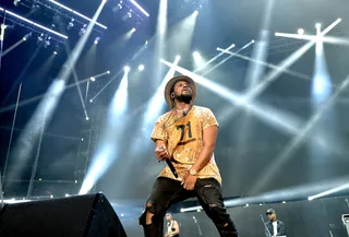 GROOVE THEORY&nbsp; - "Groovy Q" was on fire for hip hop night! The TDE rhymer kept the crowd on their feet.&nbsp;(Photo: Earl Gibson/BET/Getty Images for BET)