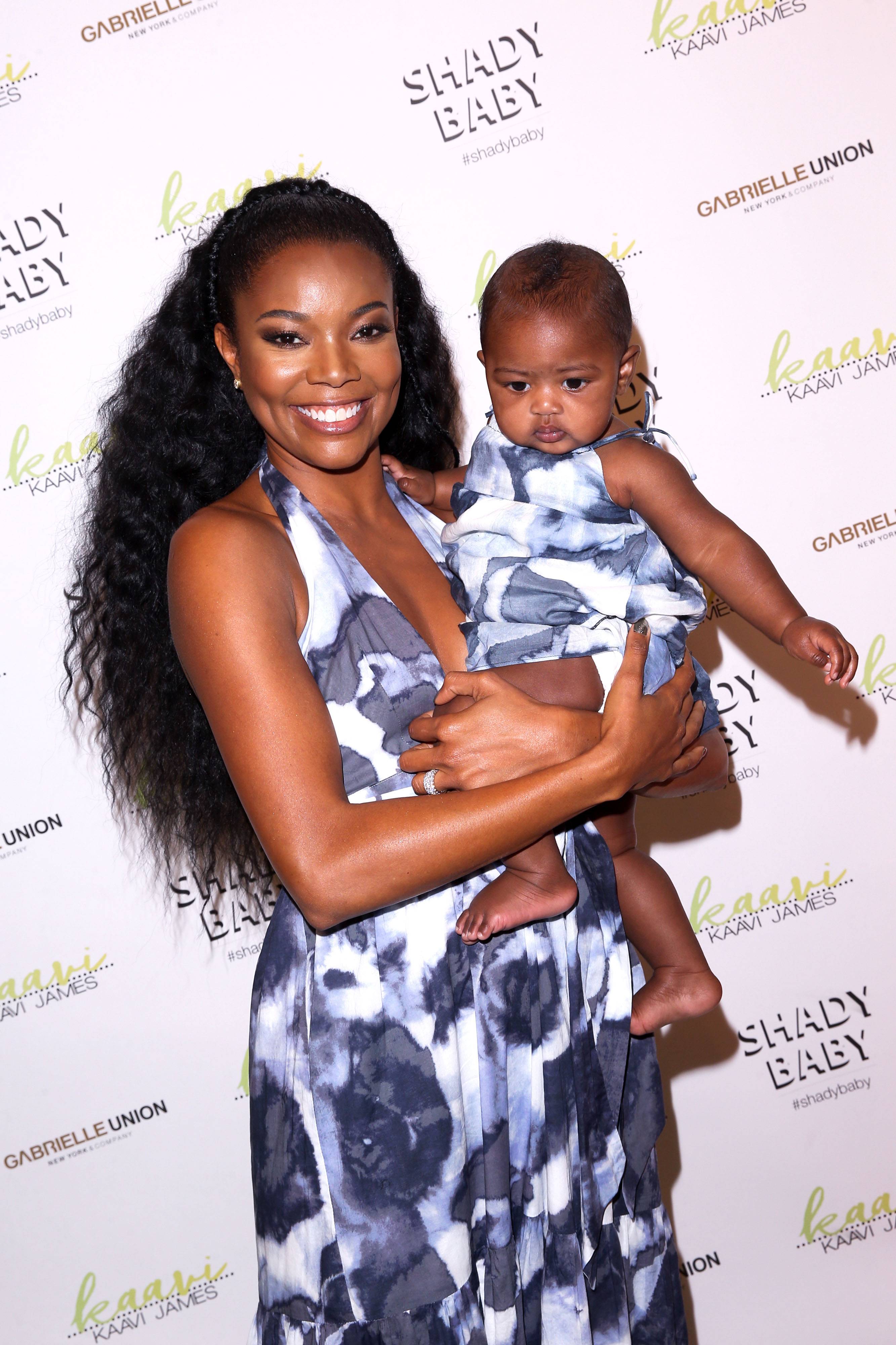 BURBANK, CALIFORNIA - MAY 09: (L-R) Gabrielle Union and Kaavia James Union Wade visit New York & Company Store in Burbank, CA to launch Kaavi James Collection on May 09, 2019. (Photo by Jesse Grant/Getty Images for New York & Company)