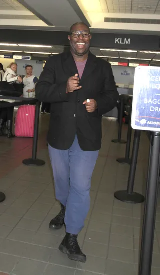 Say Cheese - Director&nbsp;Steve McQueen is all smiles after his history-making Oscar win for Best Picture as he boards a flight out of Los Angeles to head back to London.&nbsp;(Photo: Sharky/Splash News)