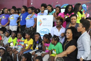 All Smiles - The young ladies flash their megawatt smiles after a day of fun activities and lively discussion.  (Photo: Sergi Alexander/Getty Images)