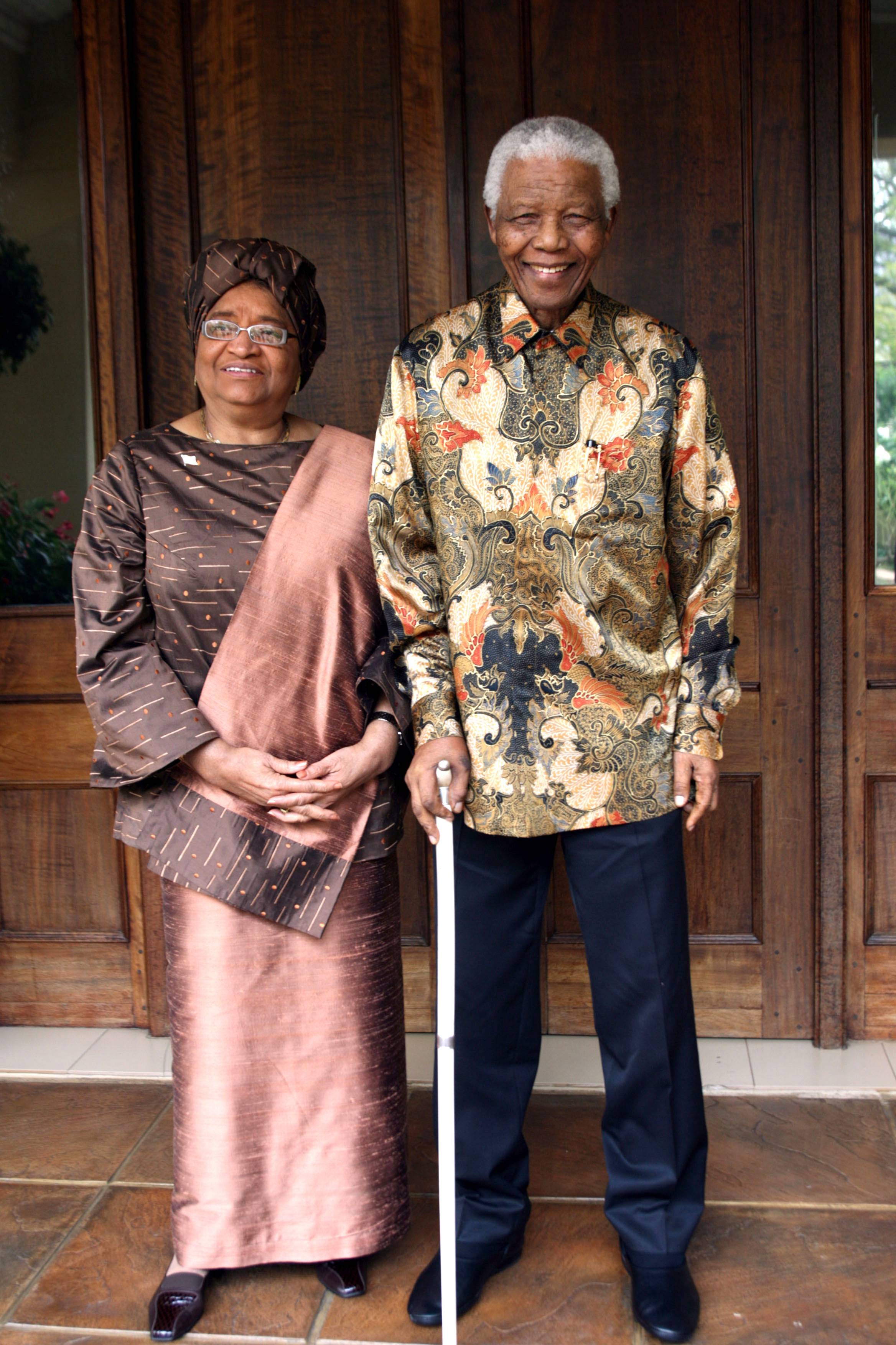 Ninetieth Birthday - Liberian President Ellen Johnson-Sirleaf greets Mandela at his residence in Johannesburg.(Photo: Juda Ngwenya/Nelson Mandela Foundation via Getty Images)