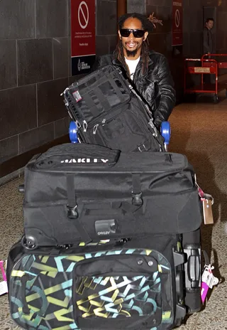 Whaaaat?! - Lil Jon arriving at Melbourne International Airport with more bags than Prince Akeem. The rapper/Celebrity Apprentice was in town for the MTV Snow Jam 2011.&nbsp; (Photo by Scott Barbour/Getty Images)