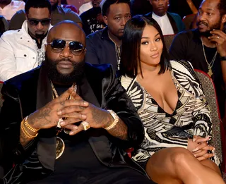 Accomplished Couple - Rick Ross and fiancee Lira Mercer look quite comfortable as they await the festivities.(Photo: Paras Griffin/BET/Getty Images for BET Networks)