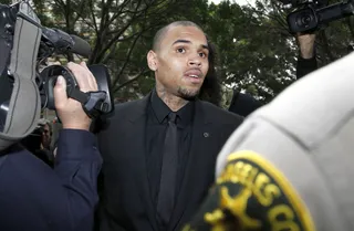 Chris Brown - Breezy's assault on then-girlfriend Rihanna was the scandal — and tragedy — of 2009. After months of silence while his team attempted to run damage control and keep the singer out of jail, Brown broke his silence with a taped apology where he expressed &quot;deepest regret&quot; and took &quot;full responsibility&quot; for his actions. Brown also vowed to seek help for his anger issues, but unfortunately the incident wasn't the last that saw his temper get the better of him. (Photo: Nick Ut/AP Photo)