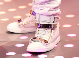 Electric Sneaks - A shot of Yo Gotti's white and gold sneaks on 106. (Photo: Bennett Raglin/BET/Getty Images for BET)