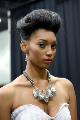 Hair Magic - This glamourous updo rocked by our beautiful model at the Fashion and Beauty @BETX runway show is perfect for any formal occasion and Pantene's 2-in-1 Keratin product gives protection necessary to pull off this look. (Photo: Vivien Killilea/BET/Getty Images)