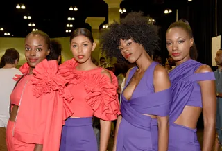 #STRONGERTOGETHER - Models rocking straight styles to curly fros bring their glow and strike up a pose backstage during Fashion and Beauty @BETX. (Photo: Vivien Killilea/BET/Getty Images)