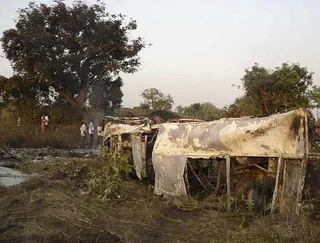 Togo Mourns Victims of Bus Crash - Six people died Sunday when a bus carrying a Togolese football team caught fire after crashing into a ravine.(Photo: EPA/STR/LANDOV)