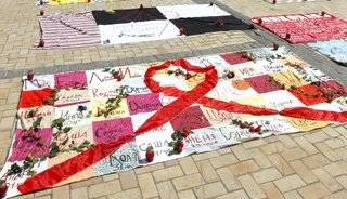 Celebrating Life - This quilt in the Ukraine was made by HIV-positive people and contains thousands of written names of Ukrainian AIDS victims.(Photo: EPA/SERGEY DOLZHENKO/LANDOV)