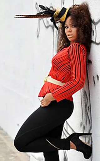 Multi-talented - Elle plays the guitar, flute and piano.(Photo: ElleVarner.com)