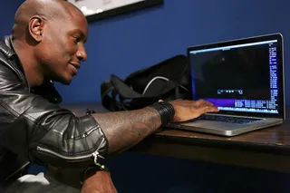 I Love This Video\r - Tyrese checking out new his new video backstage at 106 and Park. (Photo: John Ricard/BET)