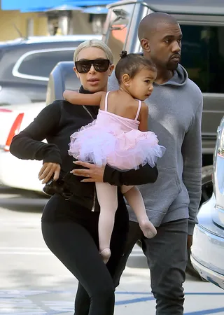 Dancing with the Wests - Kim Kardashian and Kanye West were seen taking their adorable daughter North out of dance class.(Photo: Fern / Splash News)