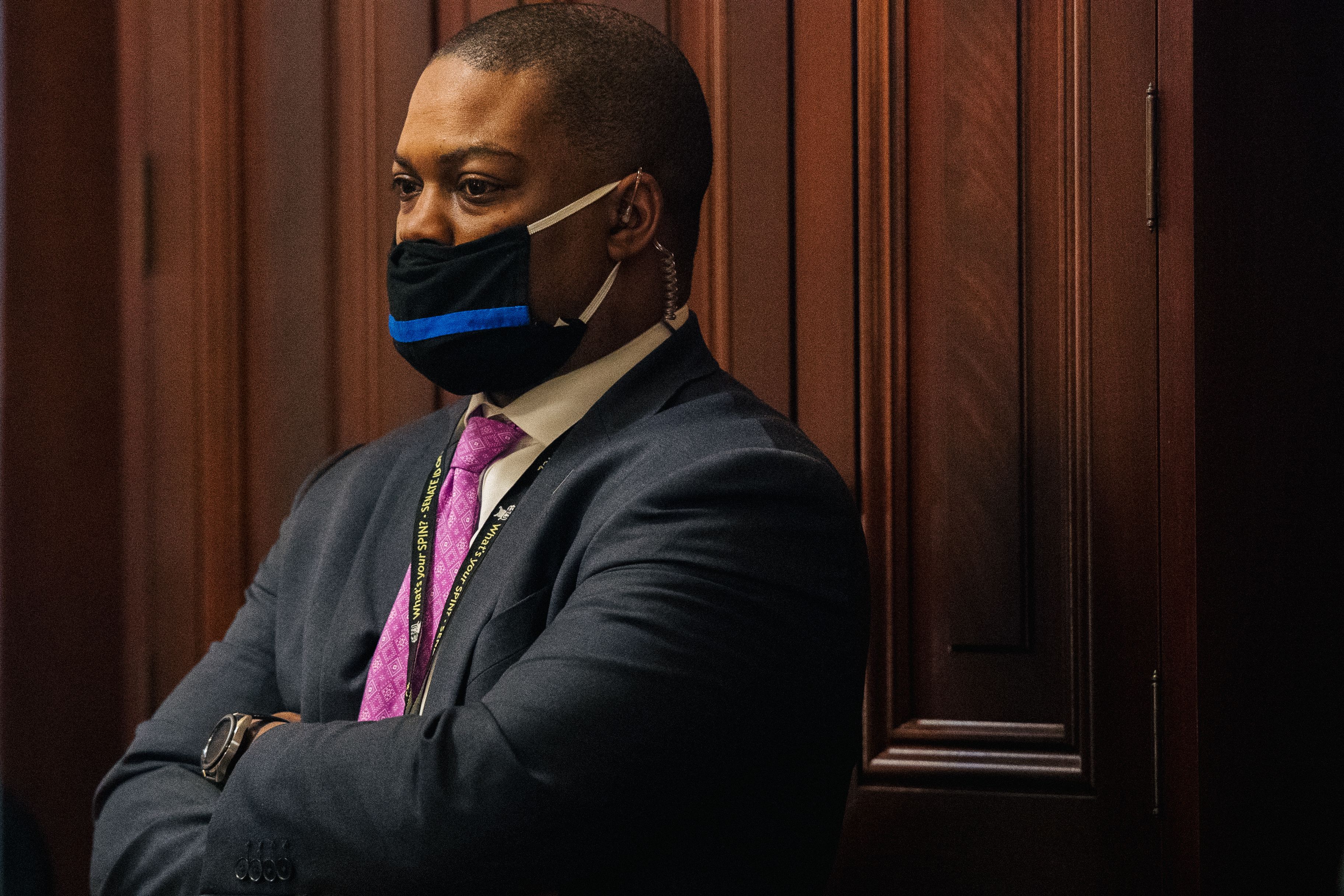 WASHINGTON, DC - FEBRUARY 10:  Capitol Police Officer Eugene Goodman watches newly released video footage of the January 6 attack on the Capitol Building during the second day of the impeachment trial of former President Donald Trump on February 10, 2021 in Washington, DC. House managers are arguing that Trump was responsible for the attack and should be barred from holding public office again.  (Photo by Brandon Bell-Pool/Getty Images)