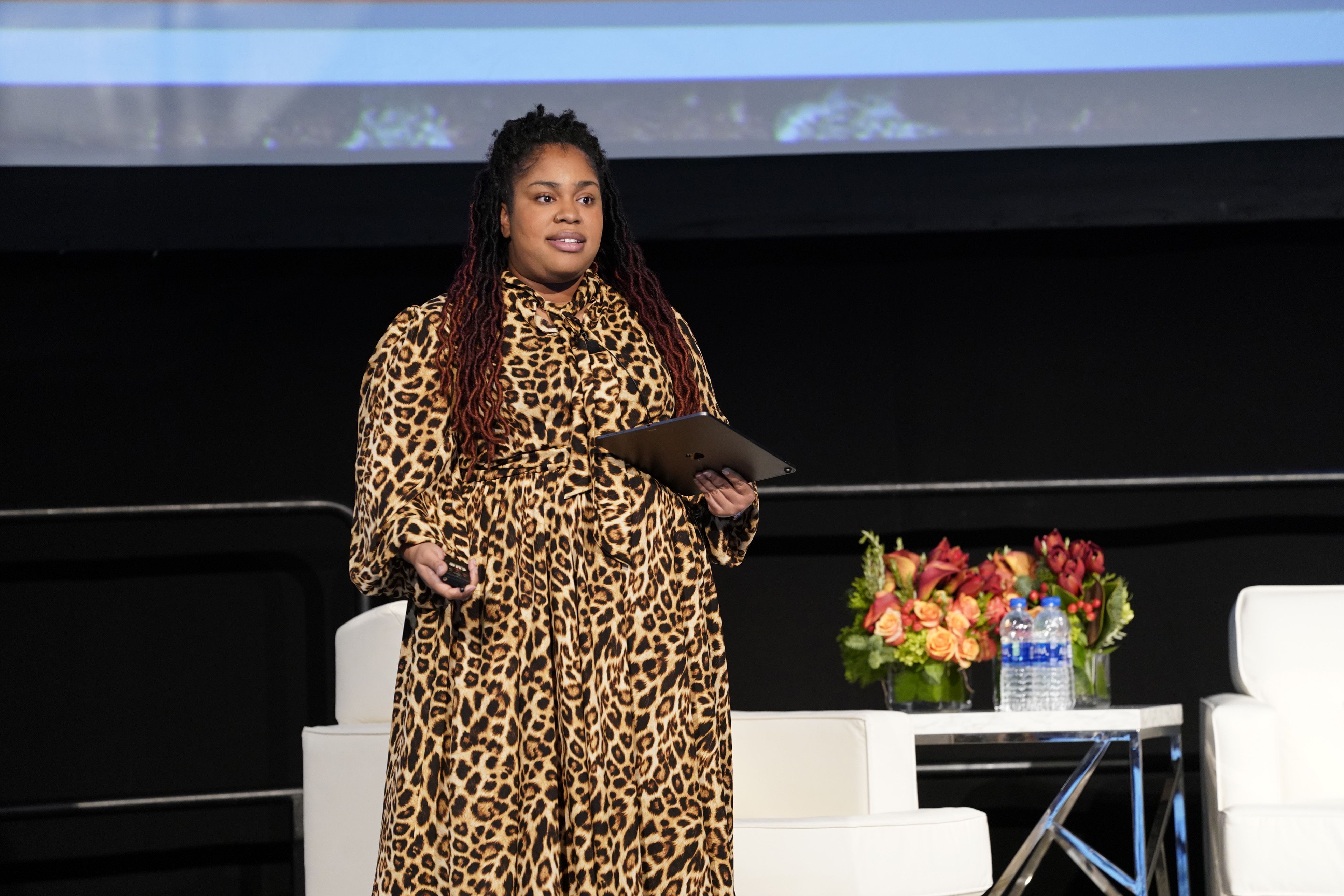 BOSTON, MASSACHUSETTS - DECEMBER 11: Author Angie Thomas speaks on stage during the Opening Night, Massachusetts Conference For Women 2019 at Boston Convention Center on December 11, 2019 in Boston, Massachusetts. (Photo by Marla Aufmuth/Getty Images for Massachusetts Conference for Women 2019)