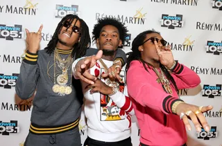 Migos - T.I. flossed hard on cuts like "Look What I Got." That unapologetic cocky demeanor must have trickled down to Migos because their stunt game shows no chill either. You can tell by their hits like "Versace" and "Handsome and Wealthy" that they were listening when Mr. Harris was counting money.&nbsp;(Photo: Neilson Barnard/Getty Images for Power 105.1)
