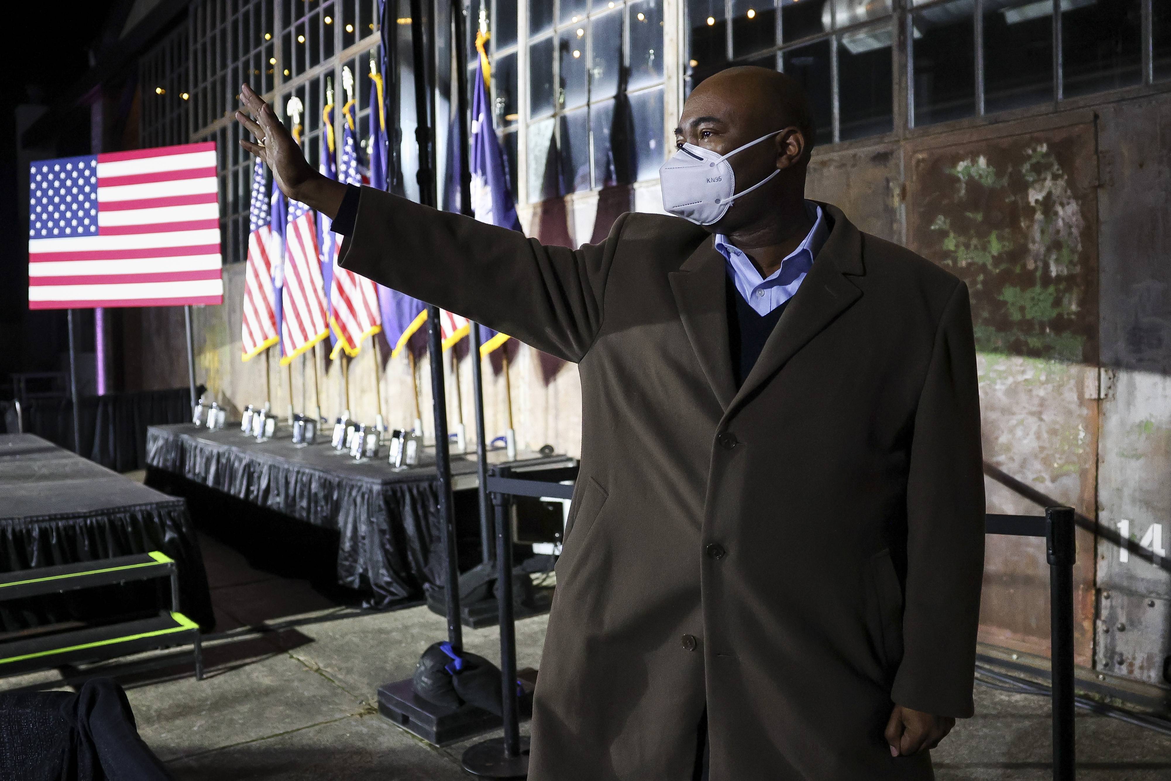 COLUMBIA, SC - NOVEMBER 03: Democratic Senate candidate Jaime Harrison waves goodbye to supporters after conceding to his challenger, incumbent Sen. Lindsey Graham (R-SC), on November 3, 2020 in Columbia, South Carolina. Graham won a fourth term in the senate with his reelection tonight. (Photo by Michael Ciaglo/Getty Images)