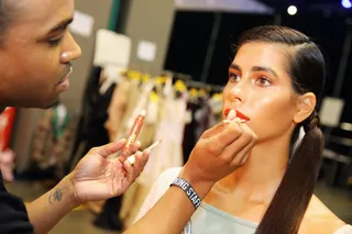 The Perfect Match - This model's orange lip and eye bring out her bright green eyes. Sometimes&nbsp;you have to find that color to make your features pop!&nbsp;(Photo: Rachel Murray/BET/Getty Images for BET)