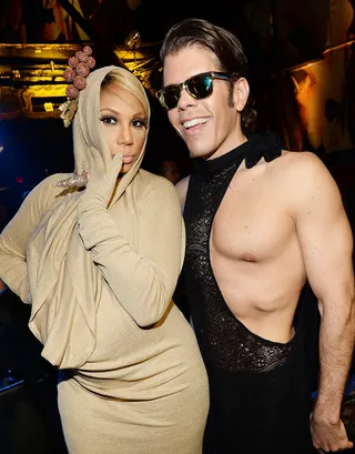 Costume Divas - Tamar Braxton shows off her growing baby bump with gossip maven Perez Hilton as the two strike a pose at the 2013 NewNowNext Awards at the Fonda Theatre in Los Angeles. (Photo: Michael Buckner/Getty Images for LOGO)