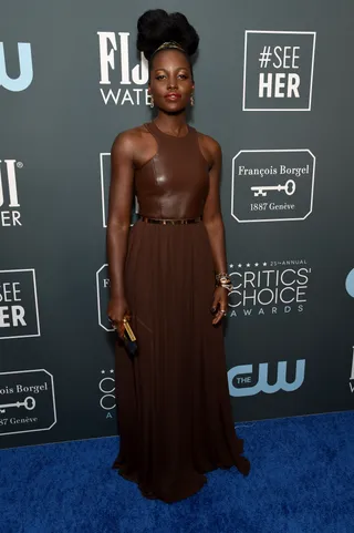 Lupita Nyongo’o - Lupita wore a brown leather Michael Kors dress.&nbsp;(Photo: Steve Granitz/WireImage) (Photo: Steve Granitz/WireImage)